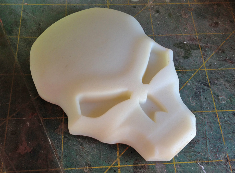 One of the clients had access to a super high-resolution 3D printer and sent me a copy of the skull emblem.
