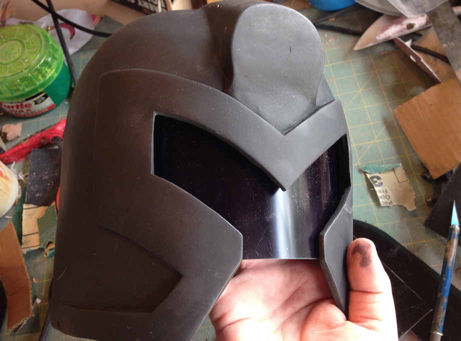  The helmet got a base coat of flat black. I also cut a welding face shield for the visor. 