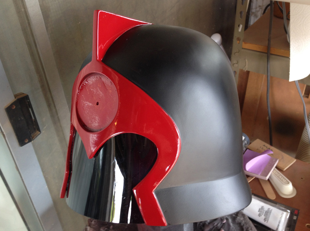  The helmet was painted with flat black paint with a glossy red faceplate. 