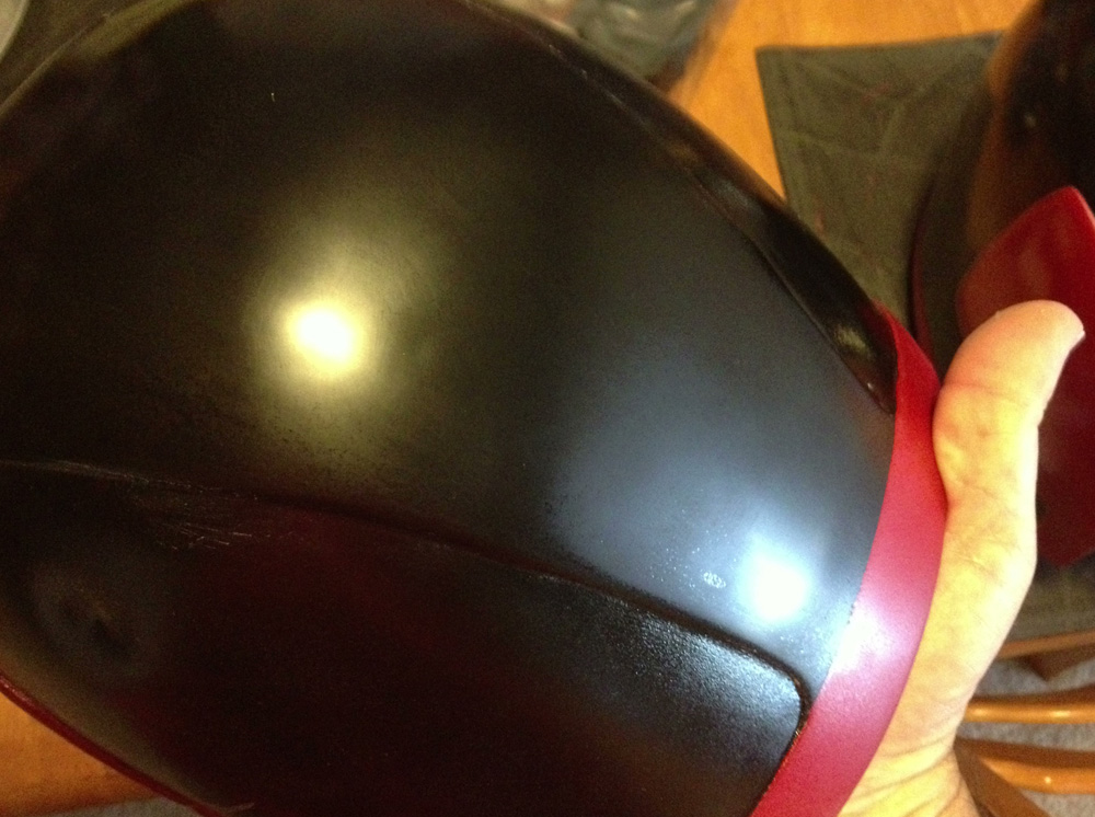  The red areas were masked off so that the gloss black could be painted. The center shown here has already been fine sanded to a smooth surface. 