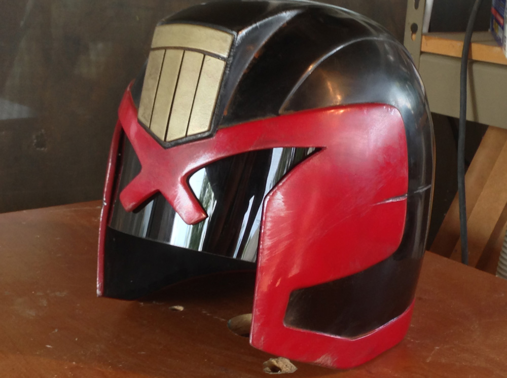 After achieving a rookie-clean helmet, it was time to weather it. I applied washes of acrylic browns and blacks for a general level of grime, used acrylic silver for edge scuffs and used a rasp for more extreme nicks and damage. 