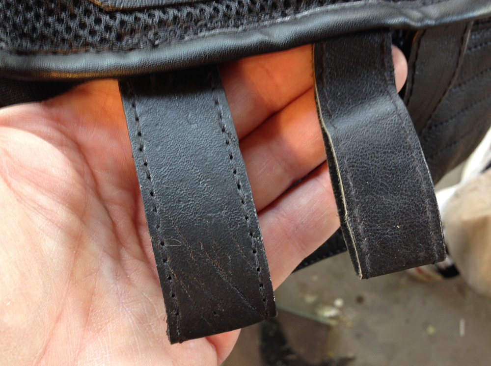  Lastly, I replaced the floppy vinyl belt loops (right) with thicker leather loops. 