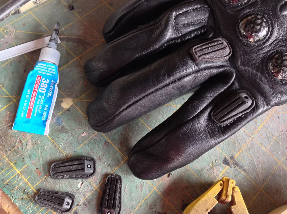 I purchased a pair of LeatherNext’s version 1 gloves which had to be modified for accuracy. I bought some rubber knuckle plates online and glued them to each finger.