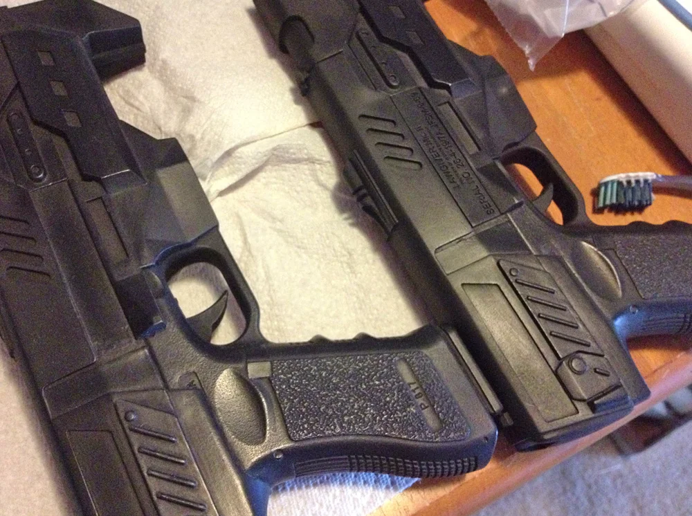 A Judge’s sidearm, the Lawgiver, was purchased as a foam filled, resin casting of a 3D printed model