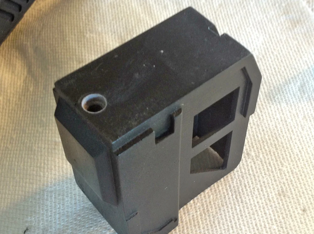 To connect the front magazine, I countersunk a hole in the base…
