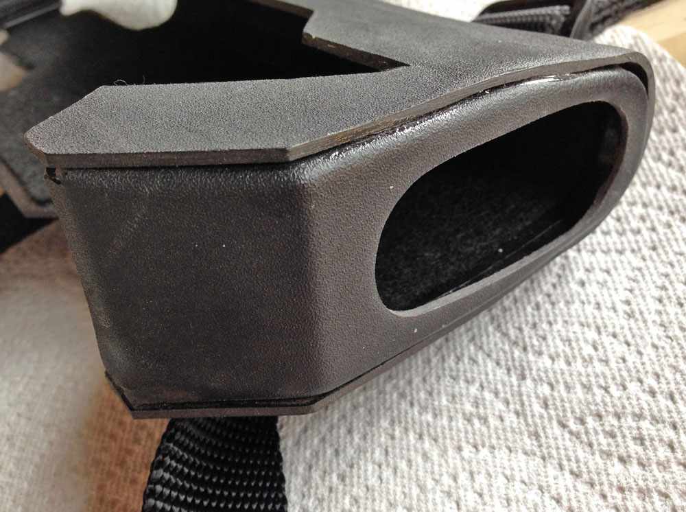  A second part was formed and glued into the tip of the holster, holding together two of the sides and keeping the gun from sliding out the bottom. 