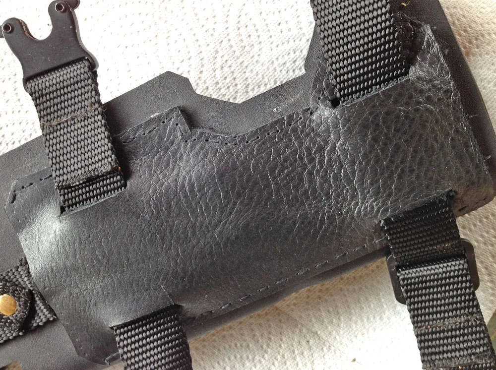 I glued and stitched a panel of thick leather to make a belt mounting system for the thigh straps.