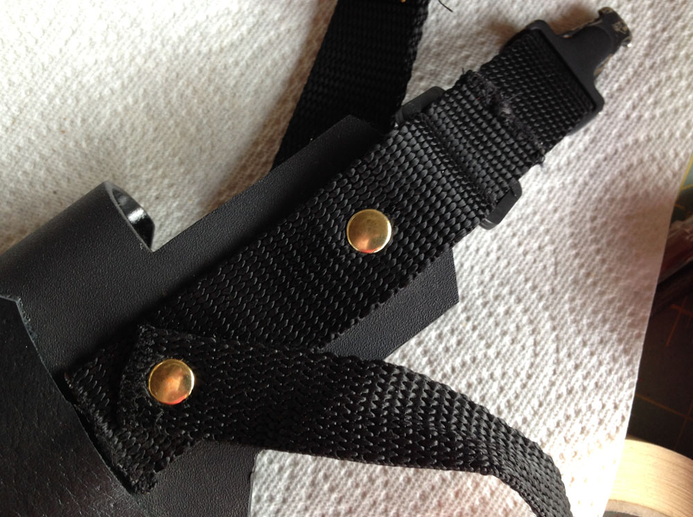  The strap was riveted to the back of the kydex along with a retaining strap. 