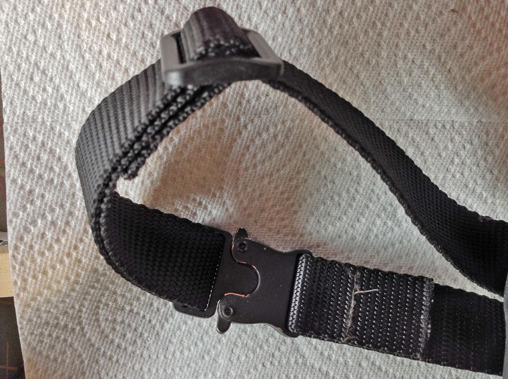  I attached nylon glides to the strap that attaches it to the belt so that there would be room for adjustment. 