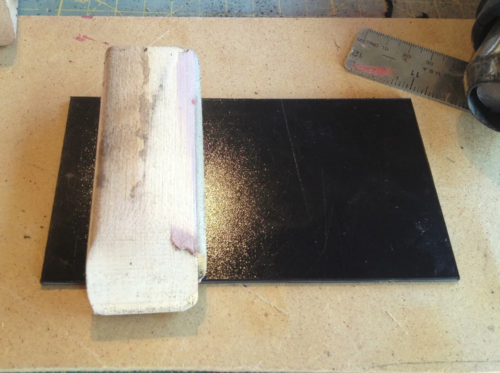 The movie magazine holders were made from 0.09 Kydex plastic so I used some leftover from the holster build. Working from my plans, I cut wooden blocks to help form the pieces.