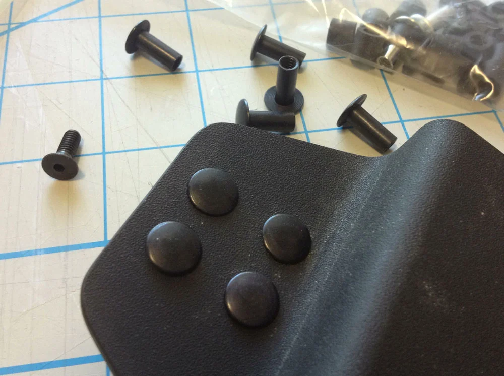Each magazine holder was attached to the base with chicago screws.