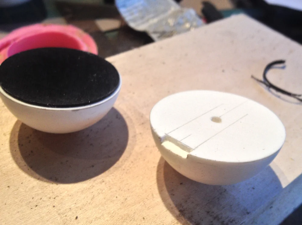 Both halves were sanded at the flat side to make room for a inset disk and I cut a space for a indicator light.