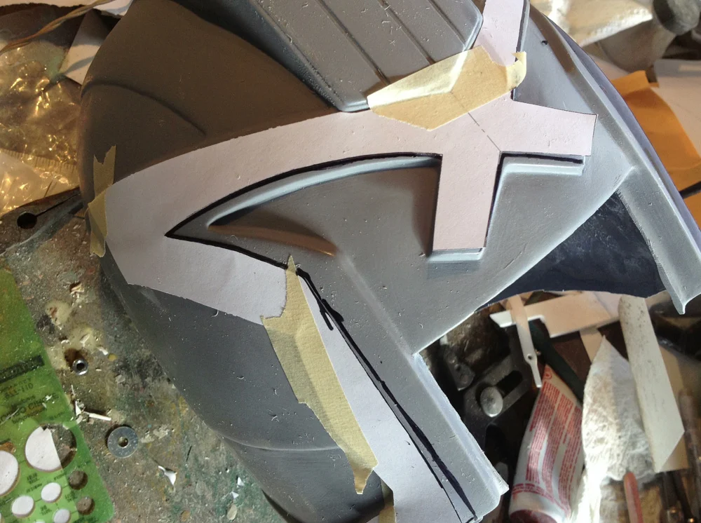 They also included paper templates for making some final corrections around the face opening. After taping them in place, I used a Sharpie to mark where I needed to cut.