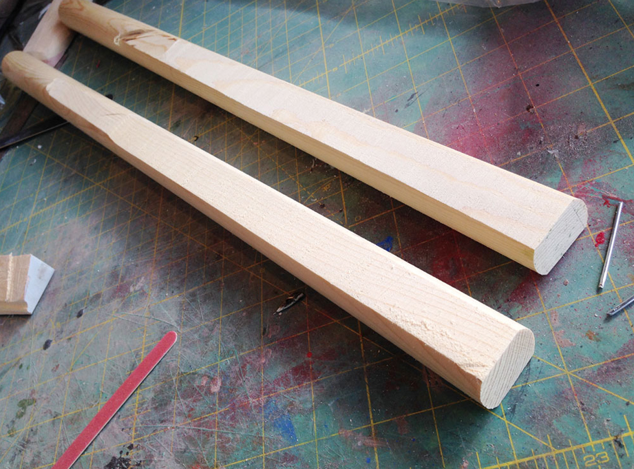  I picked up some 1-1/4” dowels and flattened the sides on the table saw. The flat sides really add to the comfort of the grip and would help prevent the axe twisting in your hand. 