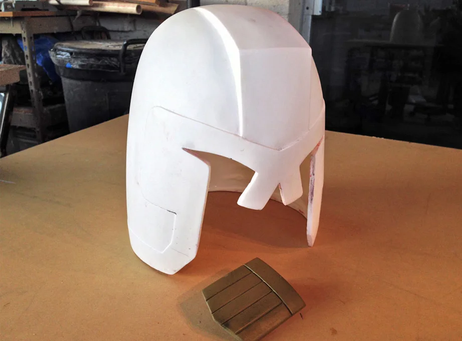 I rotocast the helmet with SmoothCast 300. The shield was cold cast with 300 and brass powder.