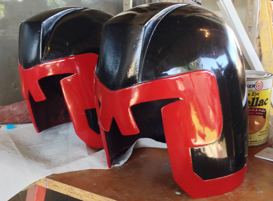  I painted the helmet with a flat black spray paint and then masked it to paint the red border. Once that dried, I wet sanded the finish and then gave it an enamel clear coat. 