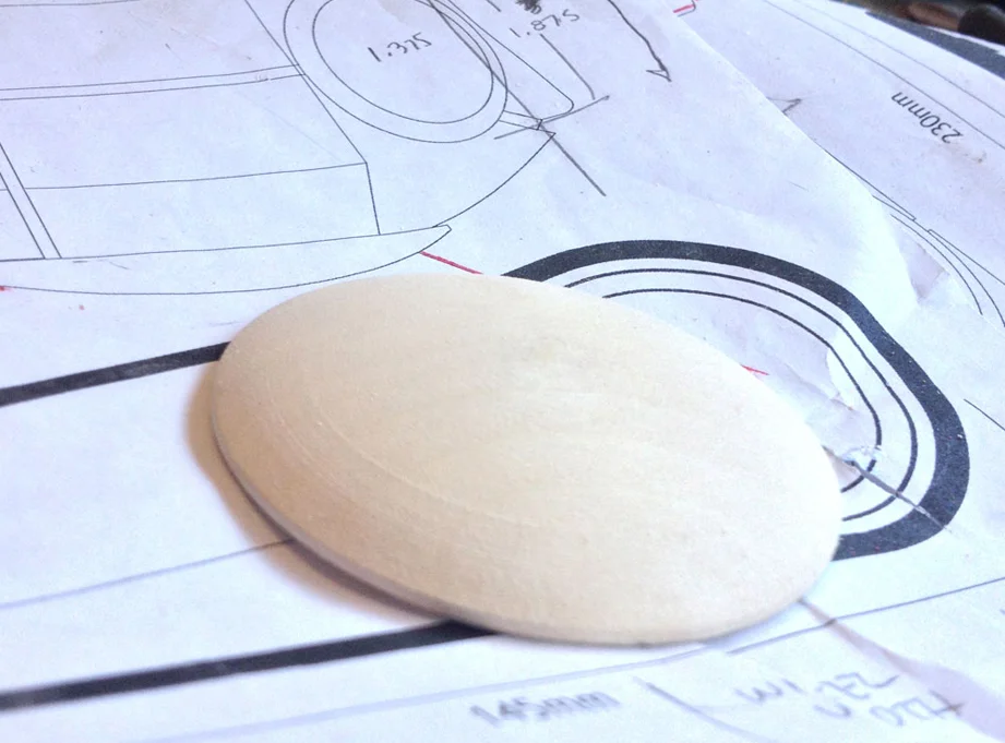 I sanded down MDF to make the domed piece that connects the hips to the torso.