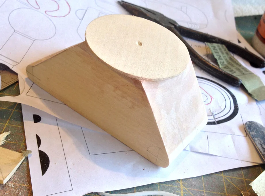 Lastly, I drilled a guide hole in the center of the dome for the torso to pivot on.