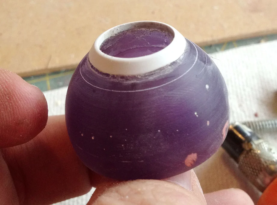 I drilled a hole for the upper arm pipe and cut a piece of styrene for the collar at the joint.