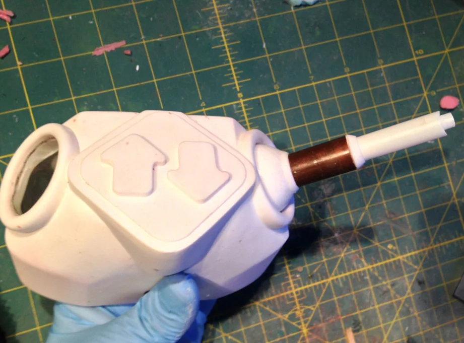 I cut out the arm holes in the torso and removed excess resin inside so the arms would rotate freely.