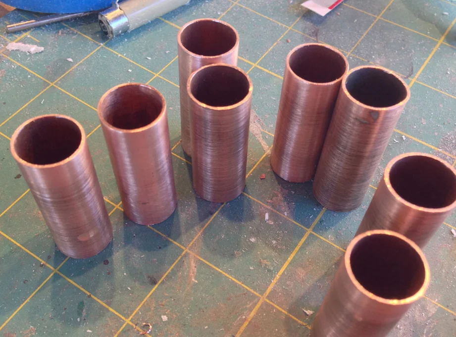 I cut segments of 1/2” copper pipe for the upper arms.