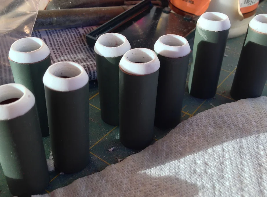 The “elbows” are then glued into the copper pipes and the forearms tested to make sure they slide smoothly. The forearms were later painted with a gloss white paint.