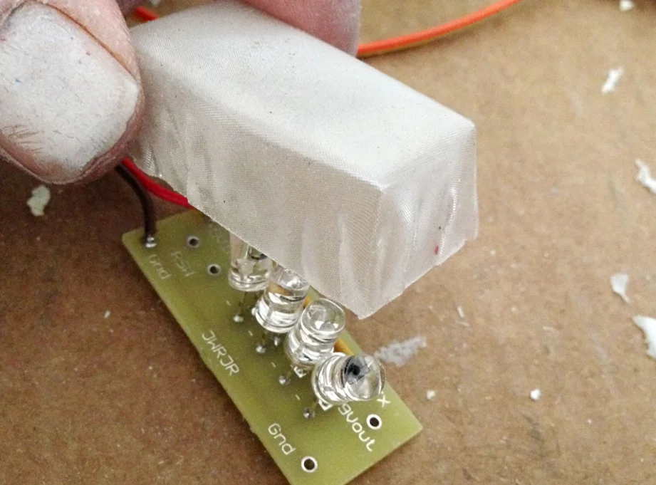 The diffusion domes were glued over the LED banks and the eye lights were hot glued so they lined up behind the eyes.