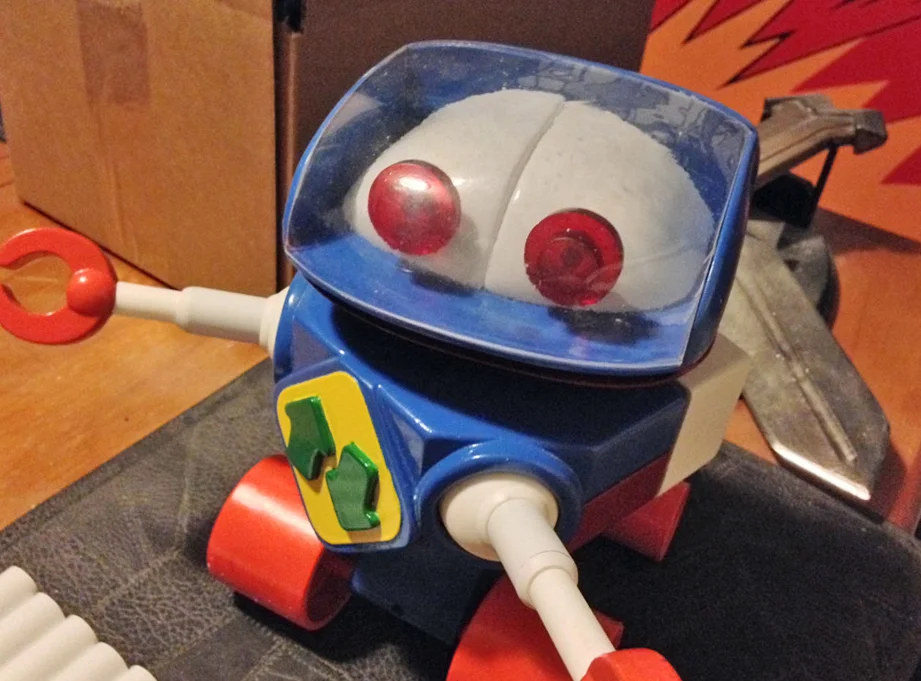 I vacuum formed clear PETG to make the head visor, trimmed it and glued it in place.