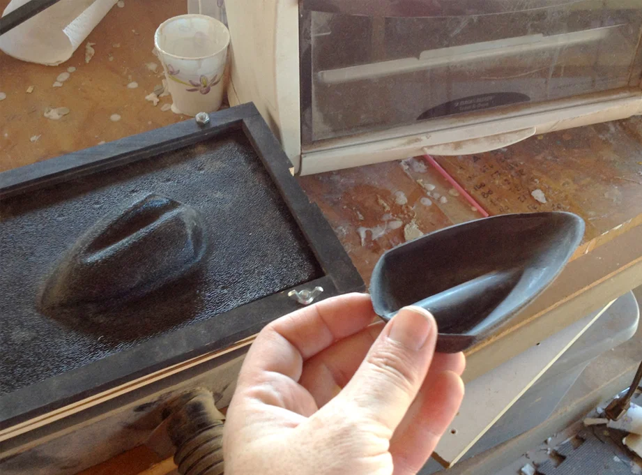 Using ABS sheets (textured side away from the master) in my mini-vacformer, I made perfect inserts for both sides of the helmet. A similar insert was vacuformed for the smaller, center dimple.