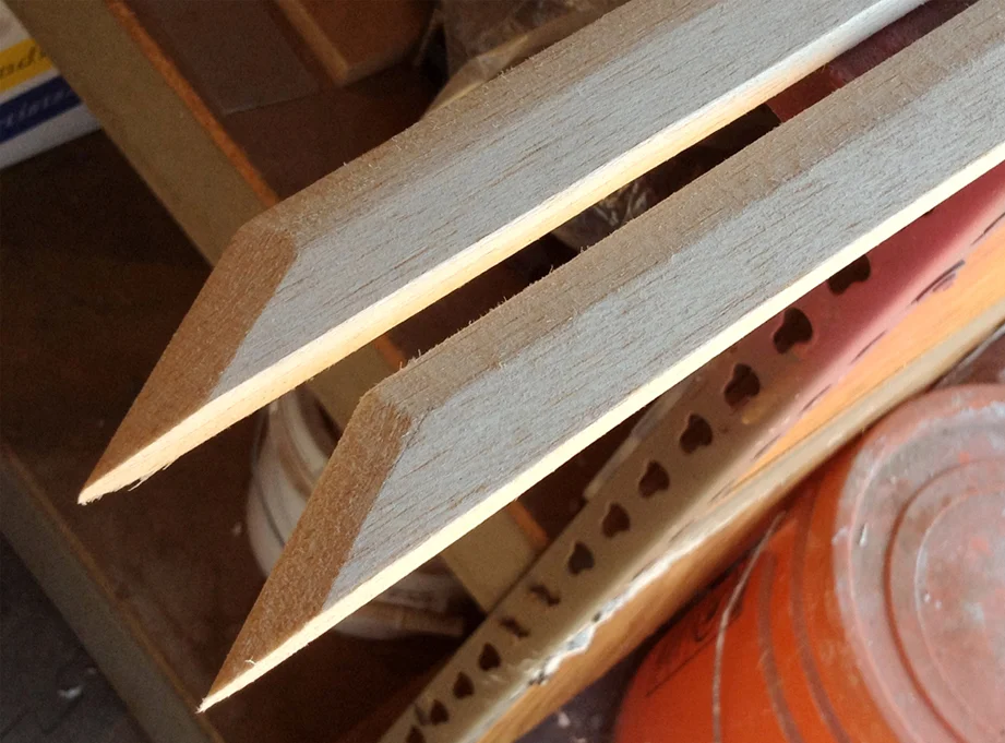 Once the resin set, I could trim out the blade profile and shape the cutting edge. Since balsa is so soft, I could cut it with a utility knife and plane the edge with a sanding block! These were the fastest swords I’ve ever made!