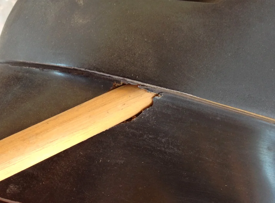 I forgot to make holes in the helmet for the hanging hardware so I had to (carefully) drill cavities in each side, using dowels to ensure that they were protruding at the same angle.