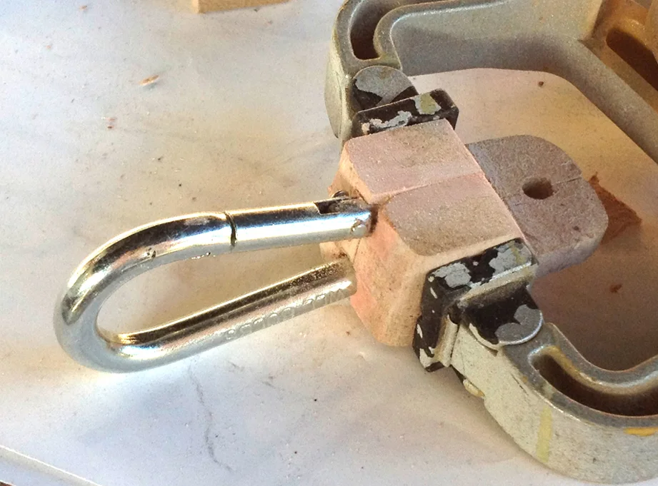 Meanwhile I used Bondo to blend the bracket into the spring link.
