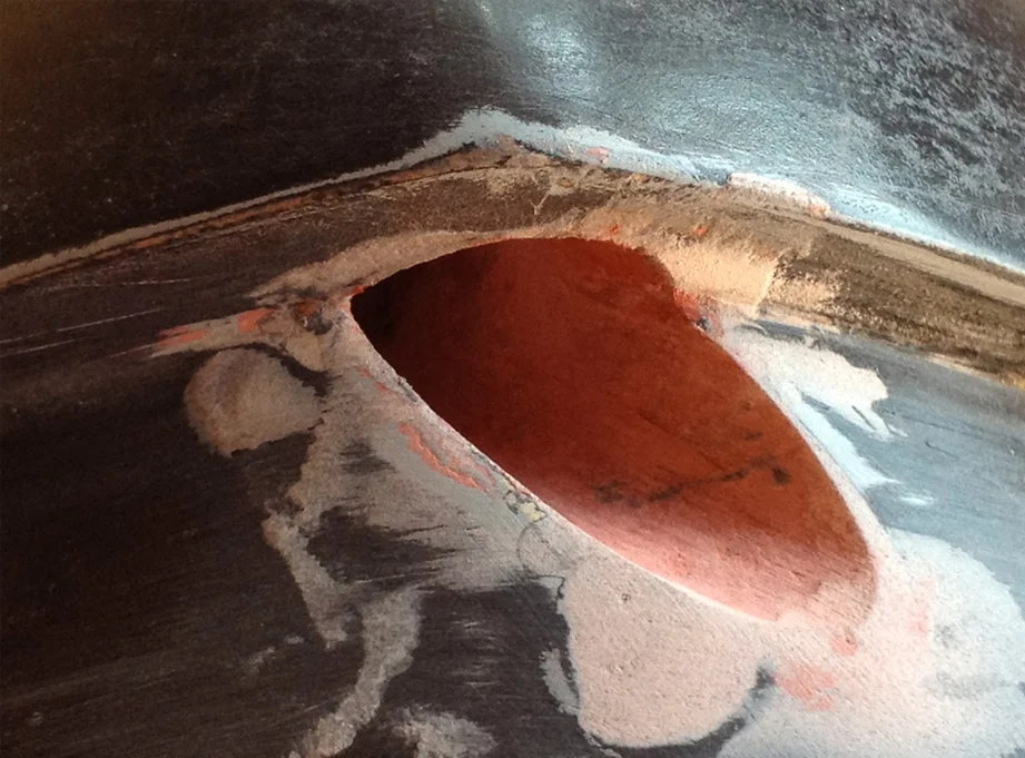 I used Bondo to smooth out the inside of the hanger holes.