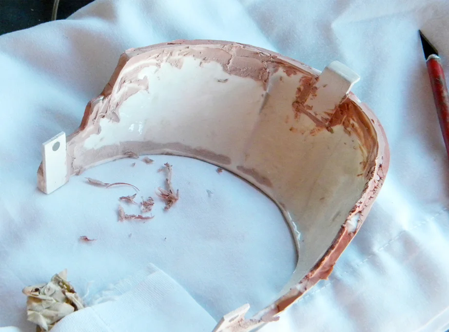 To re-attach it, I added a styrene hook to the back and tabs with rare-earth magnets at the front corners.