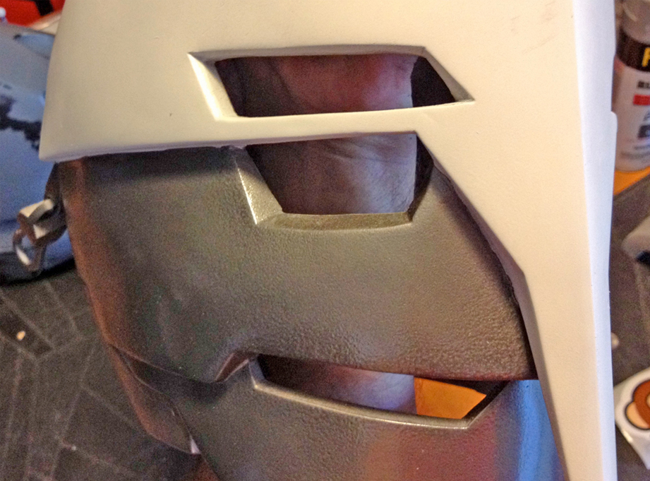 Next I masked off the white areas and painted the lower half with Hammered Grey paint. 
