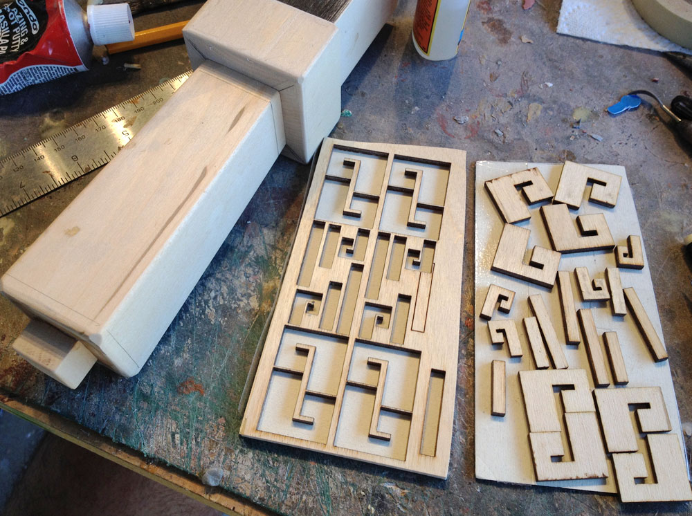 My friend Fev was nice enough to laser cut the decorative bits from thin hobby plywood. Since I needed 4 sets, this saved me tons of time hand cutting and they are perfect beyond what I could do by hand.