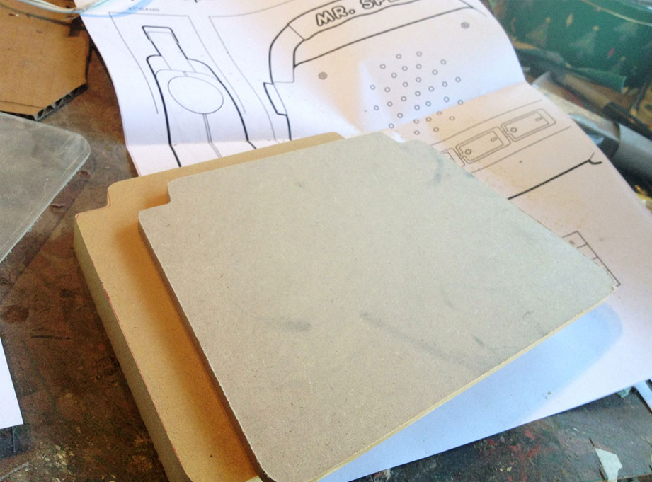  After drawing up plans, I started by cutting layer of MDF to make the thickness of the toy. Each side was made with a layer of 3/4″ MDF and a layer of 1/4″ MDF. 