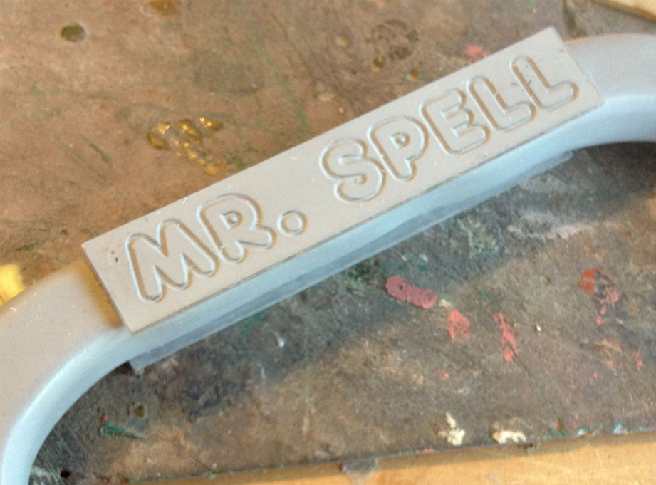  To make the engraved name plate on the handle, I had the letters cut into 1/8″ acrylic panels and glued them to both sides. 