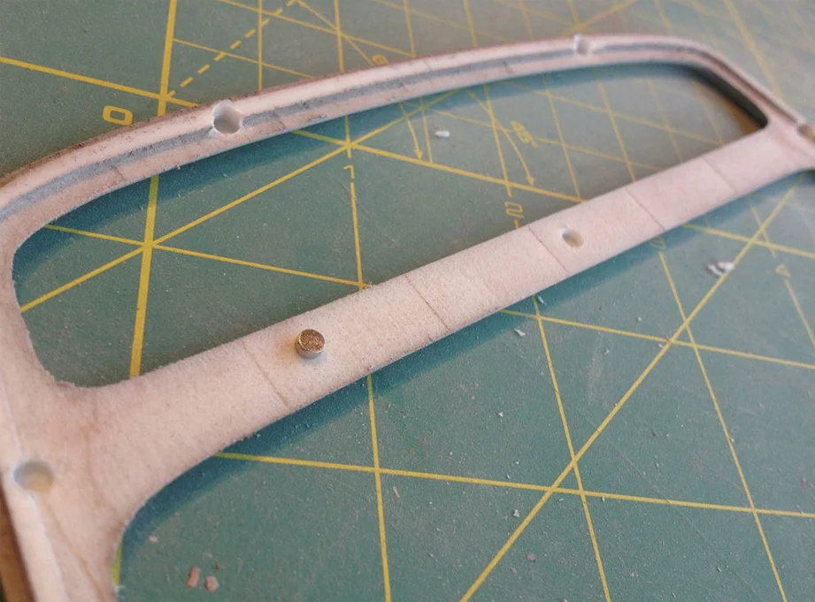One last modification before molding was to drill small holes in the frame and body to house small magnets.