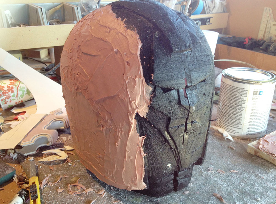  Next I sealed the foam with acrylic paint and then added a light coat of Bondo over the entire surface. 