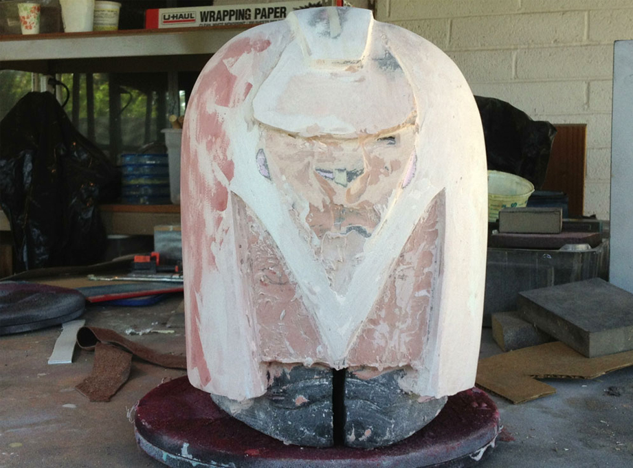  As tempting as it was to work on the big lion face, to get the helmet symmetrical I needed to start with the dome. Both the right front and left back were not round enough so I had to add Bondo until they matched their opposite side. 