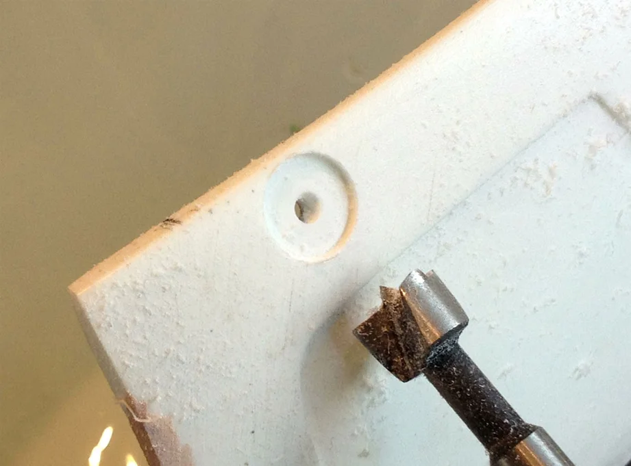 I used a forstner bit to countersink the mounting holes.