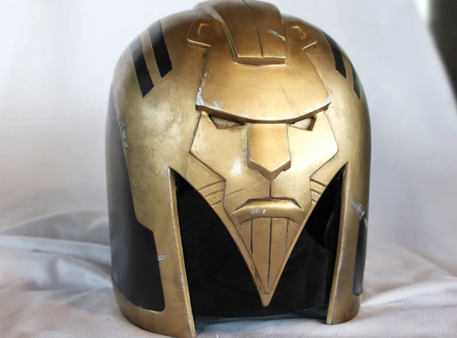 Next, it was time to beat up the helmet with files, rasps and saws to match the battle damage on Dredd movie Judge helmets. Adding silver nicks and scratches and a level of Mega-City grime was enjoyable though. The gold looks better too!