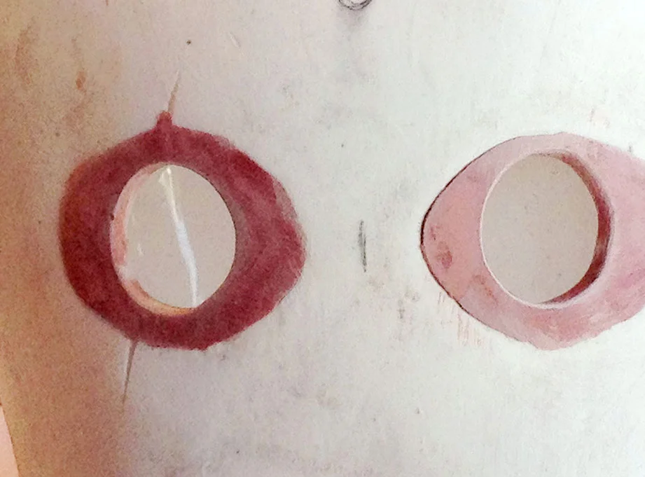 I drilled the new eye holes into the plugs