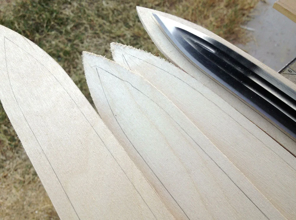 After drawing up plans based on the available reference, I cut the sides of the scabbard from 1/8″ Baltic Birch plywood, adding a 1/4″ around the blade.