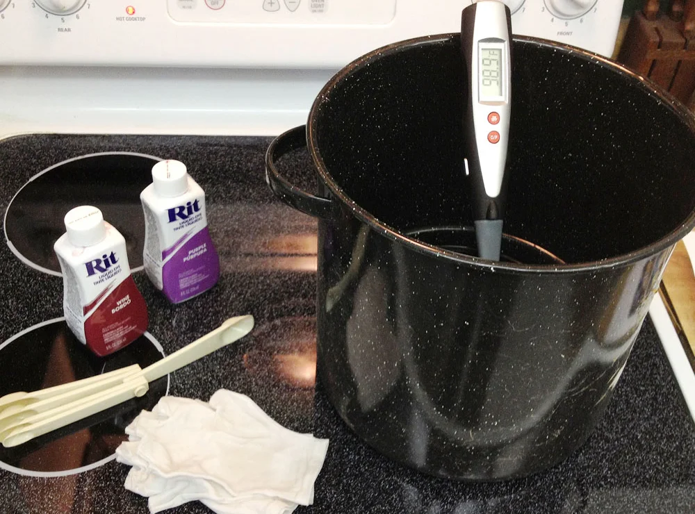 I heated some water on the stove to 115ºF and added the dyes.