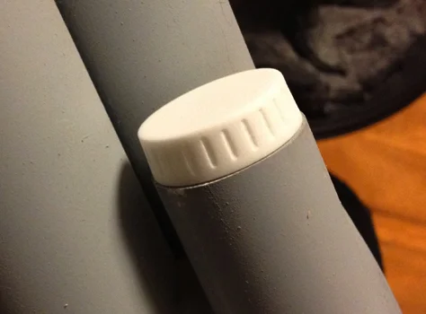 The tip of the magazine tube has a row of vents that would be extremely difficult to accurately cut by hand. Instead I modeled the piece in 3D and had it printed in plastic by Shapeways.