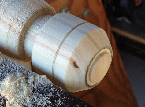  To finish the magazine cap, I lathed the tip form a piece of wooden dowel. 