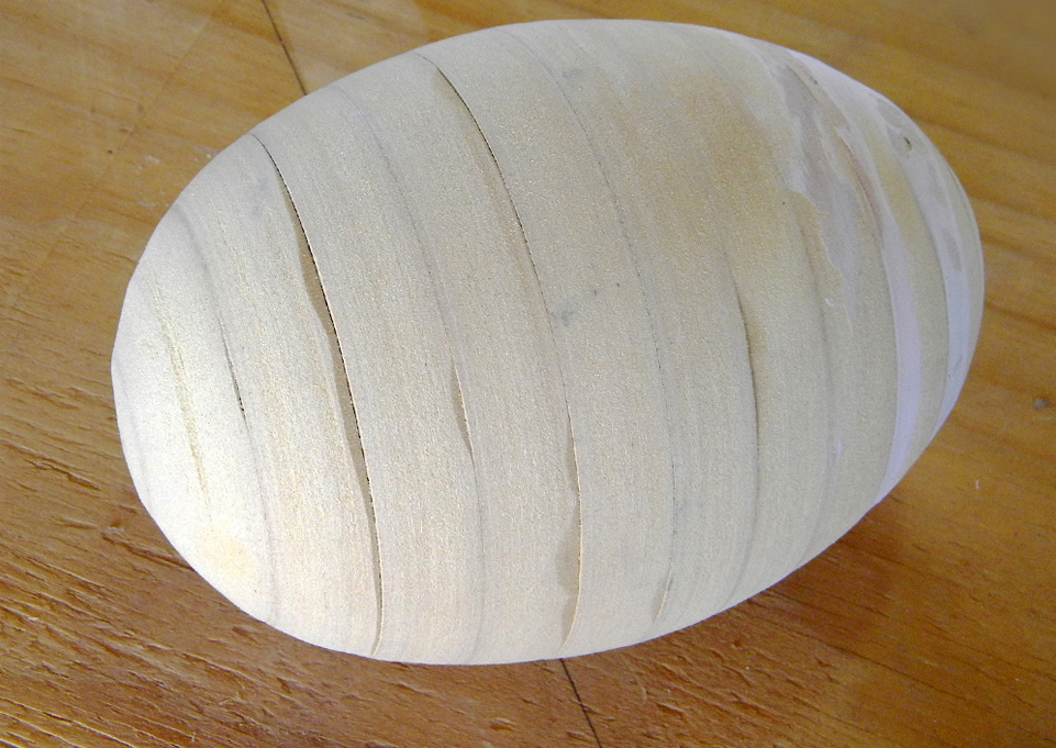  A quick spin on the lathe formed the MDF into an egg shape. Since this will be covered in epoxy putty, I didn’t have to worry about making it perfect. 