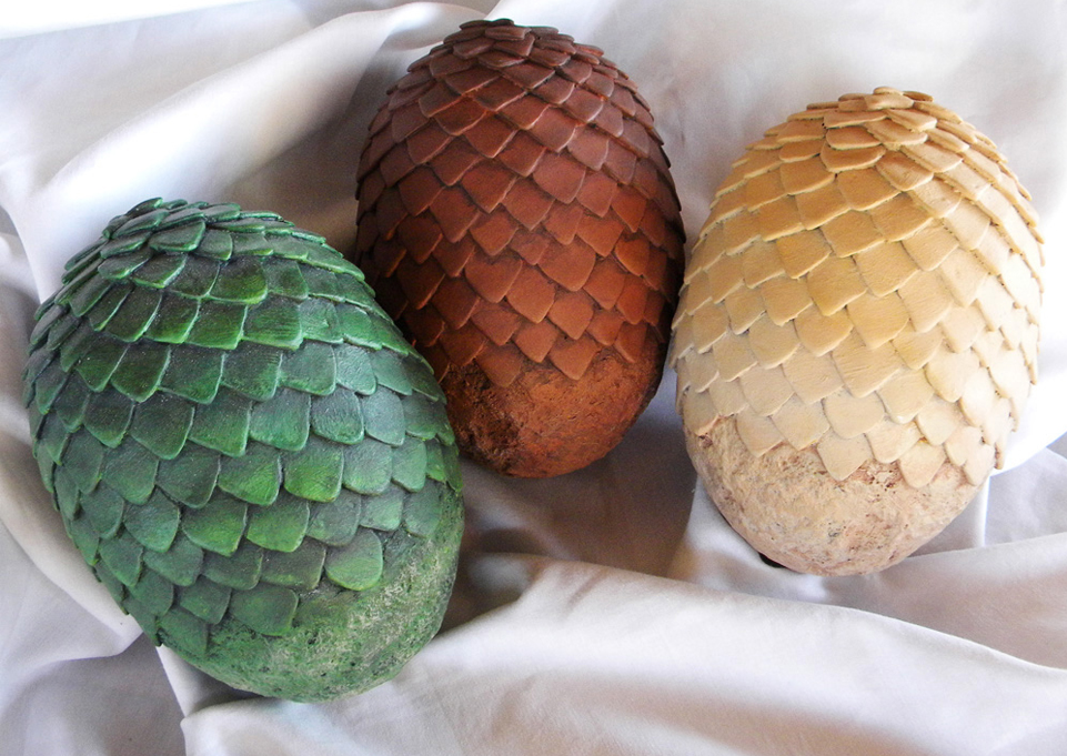  The final painted eggs. Each egg was sprayed with a base color coat, a dark wash applied to bring out the recessed details and some dry brushed lighter shades on the raised surfaces. 